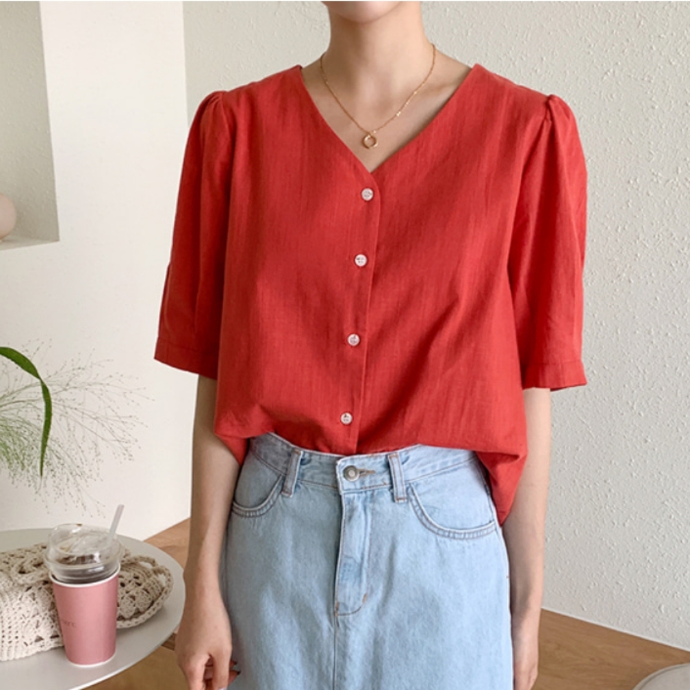 Red v-neck button up blouse